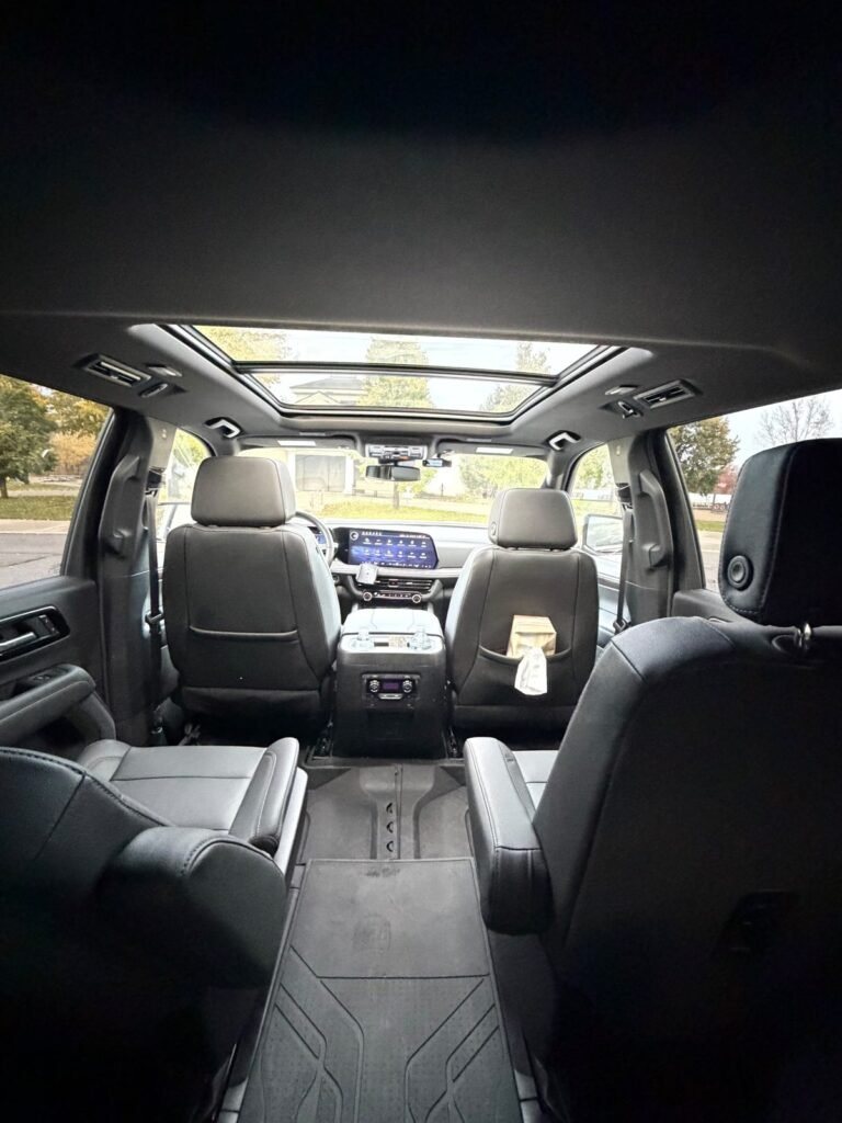 Leather seats and panoramic sunroof inside our Chevrolet Suburban chauffeur SUV in Minneapolis